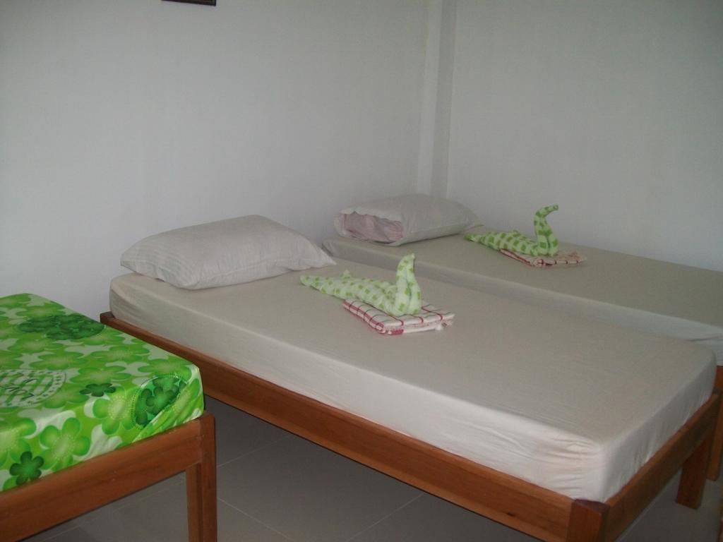Charm Guest House Puerto Princesa Zimmer foto